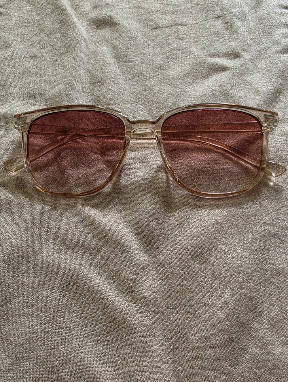 Clear Frame Sunglasses with Rose-Tinted Lenses